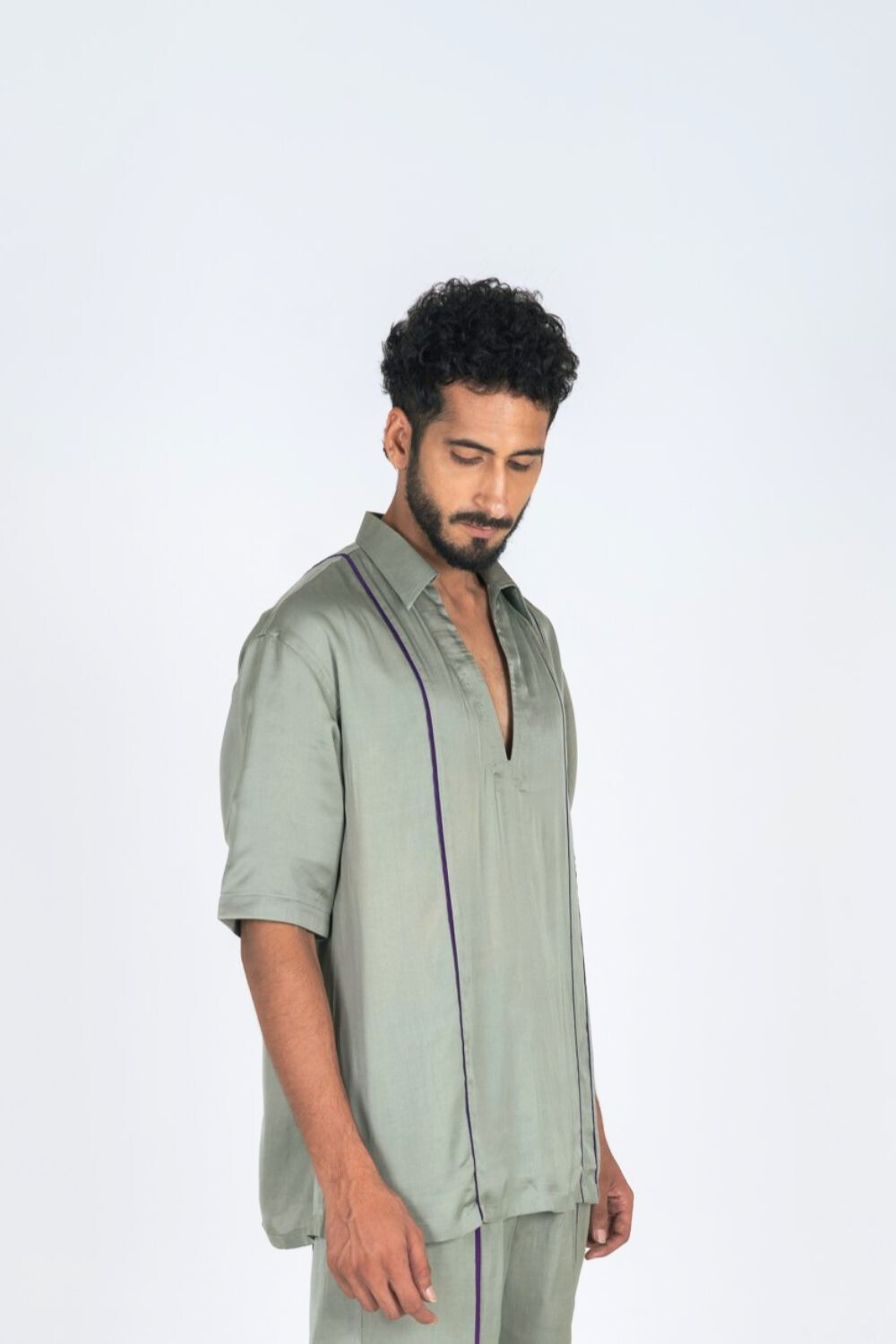 Green Shirt with Purple Pipin